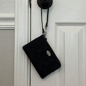 Authentic Coach wristlet in black